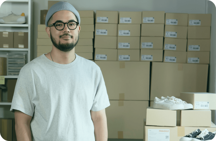 business owner and boxes