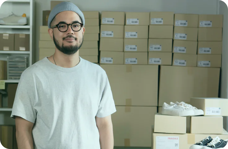 business owner and boxes